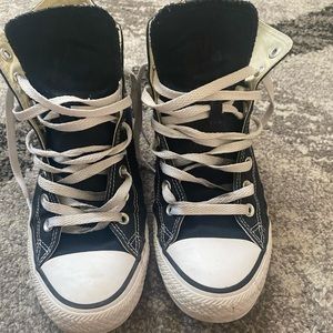 Black and white converse high tops